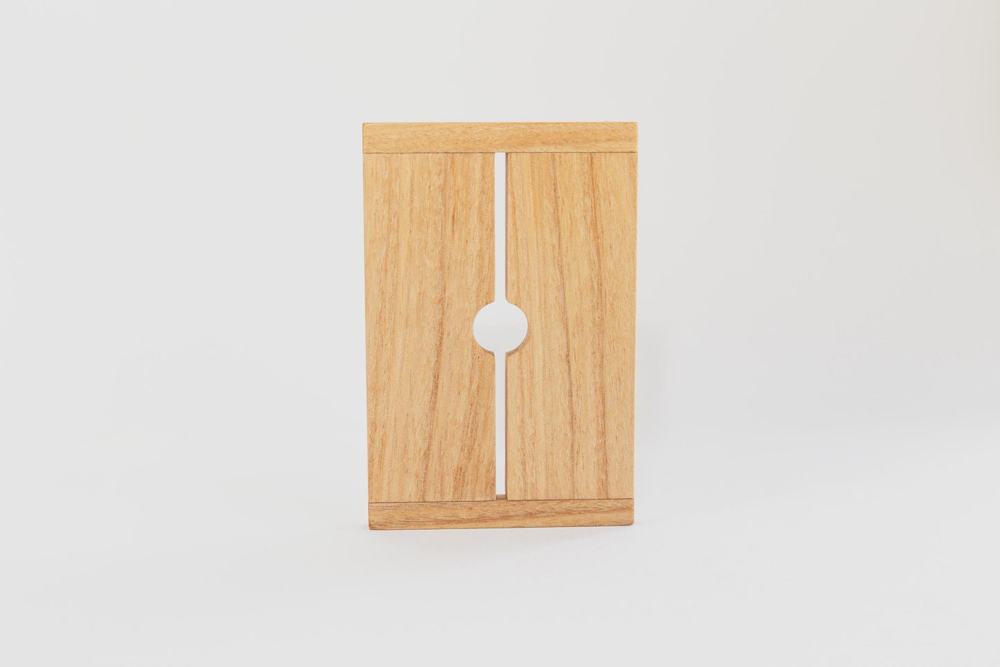 Close up of wooden tofu press lid from Tofu Press Australia on a white background.
