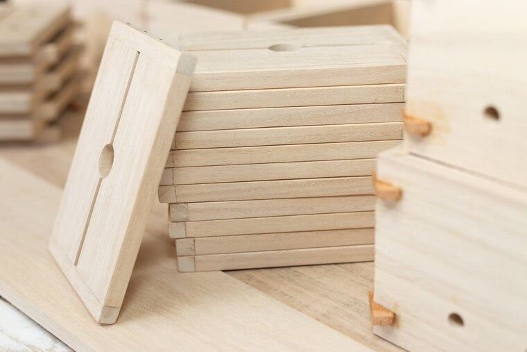 Close up of wooden tofu presses during Tofu Press Australia's construction process.